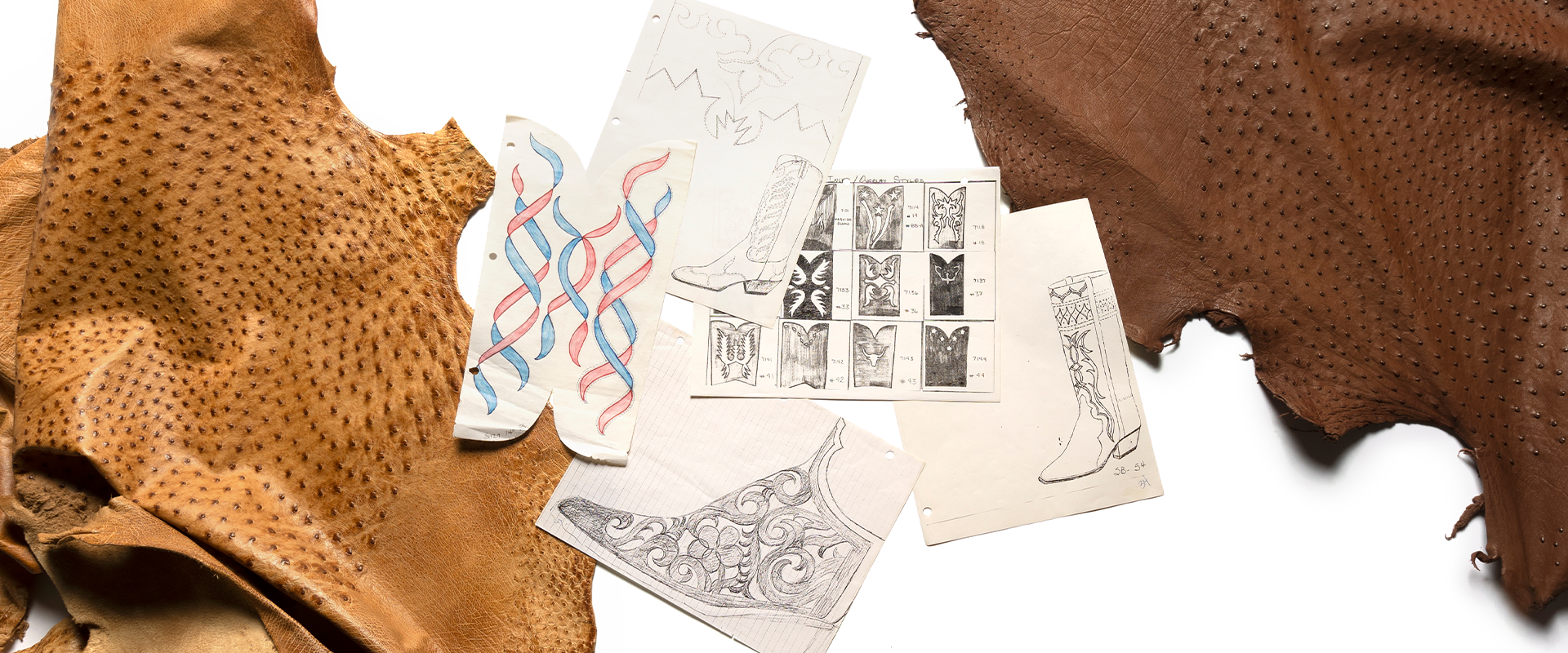 flatlay of sketches of cowboy boots and pieces of leather